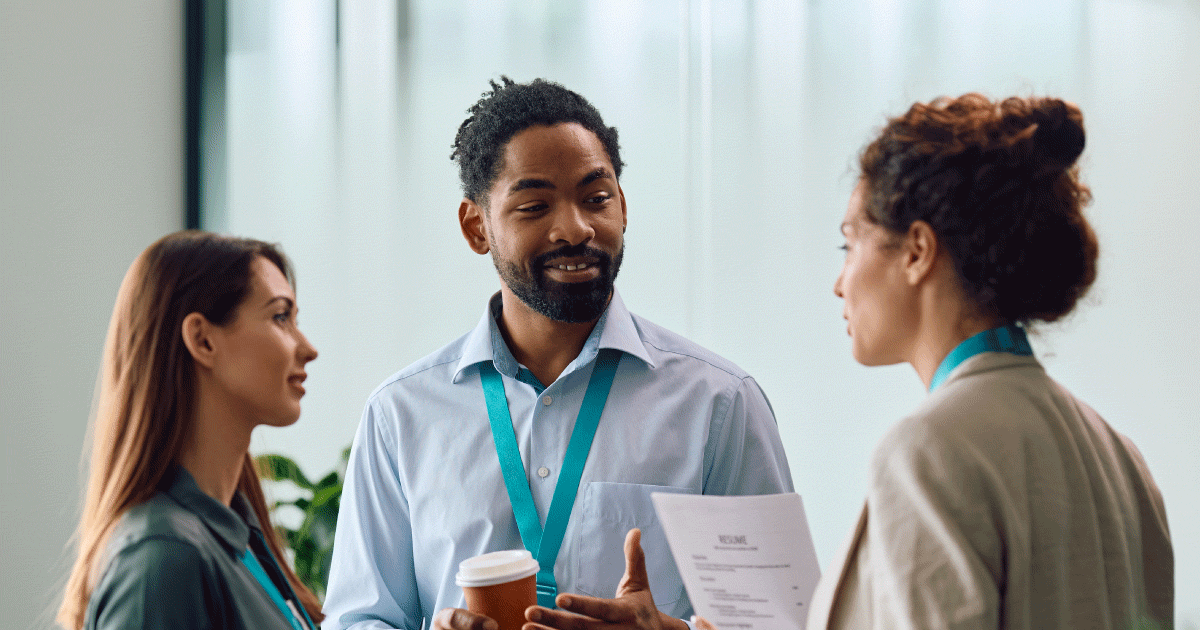 Three healthcare professionals in discussion