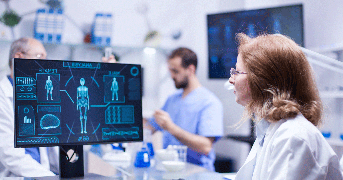 Nurse looking at x-ray screen