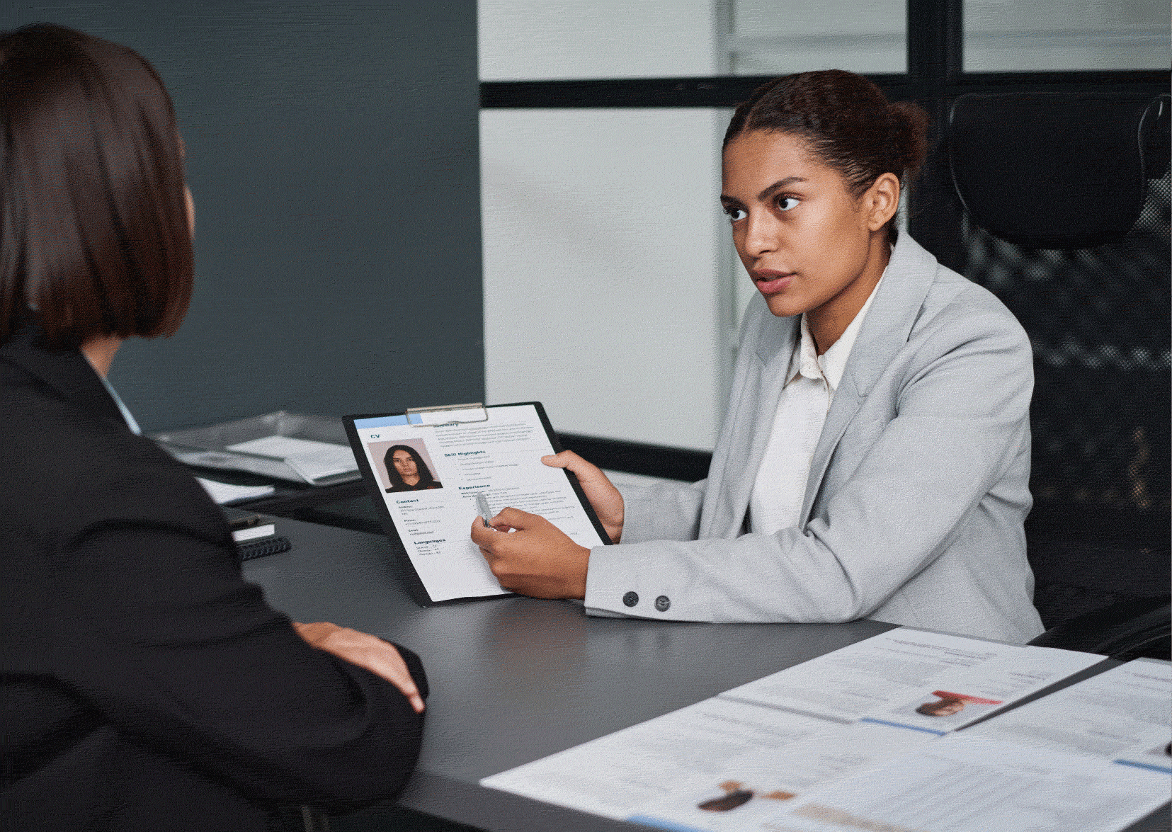 Woman interviewing candidate