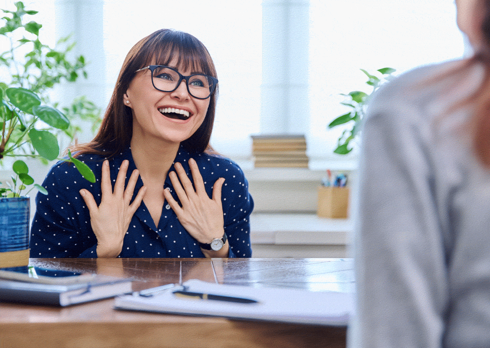 Happy woman smiling at recruiter