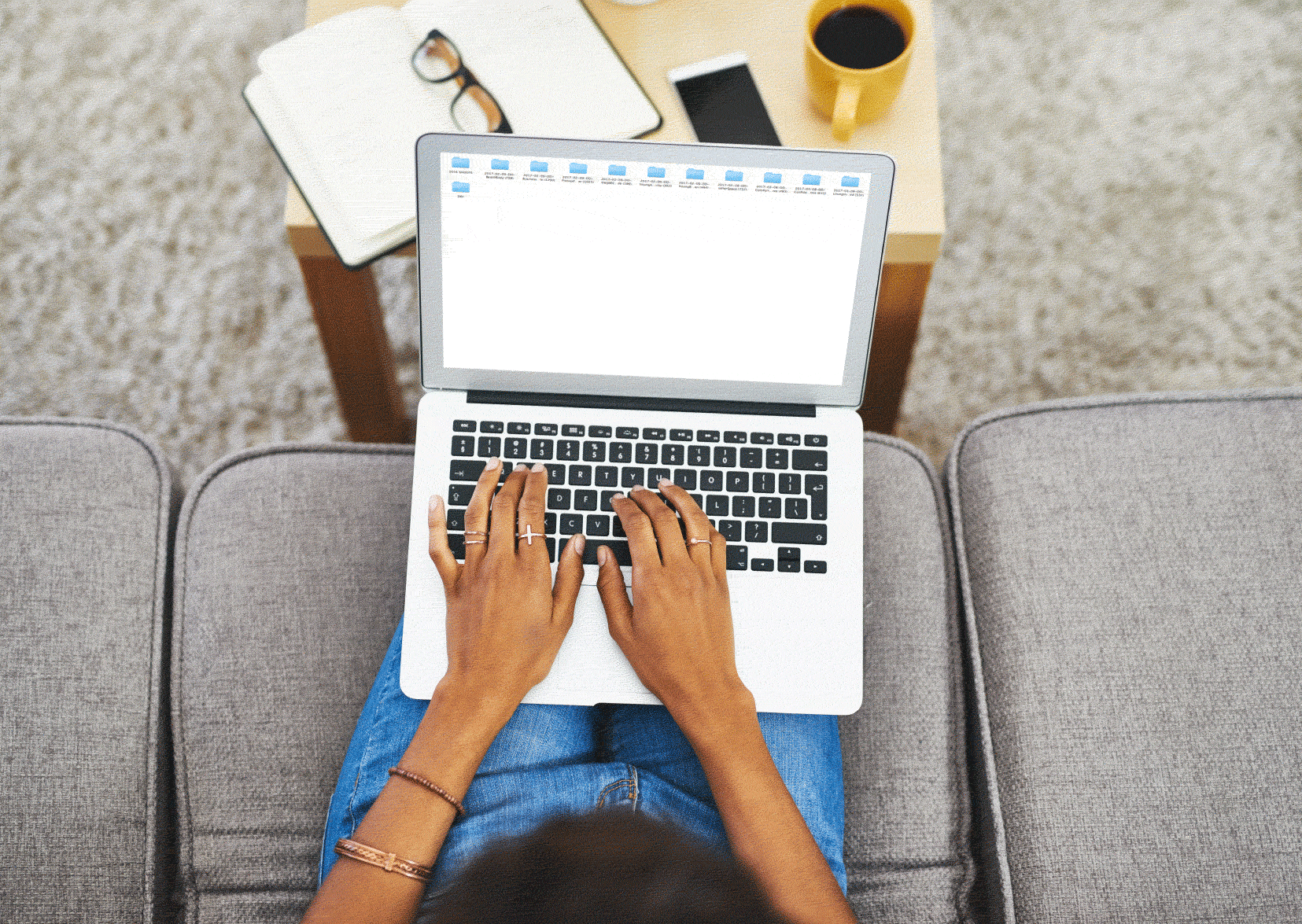 Woman writing email on her laptop