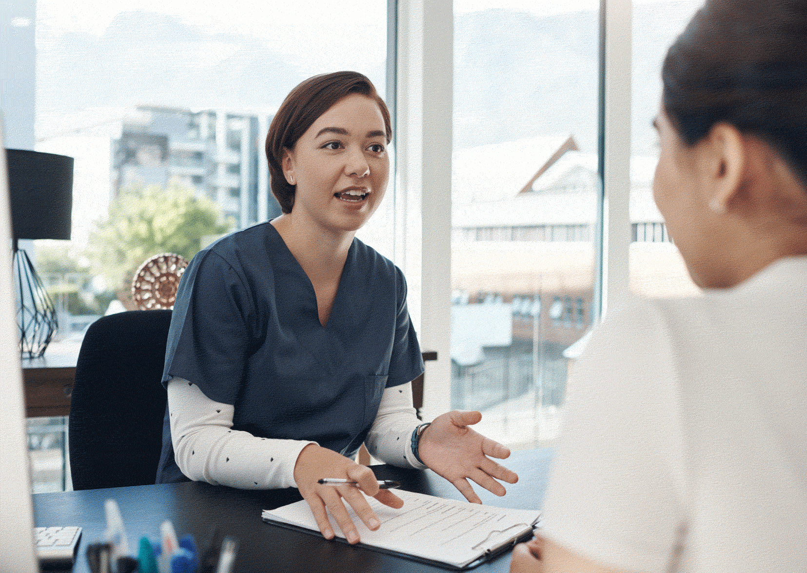 Nurse interviewing candidate