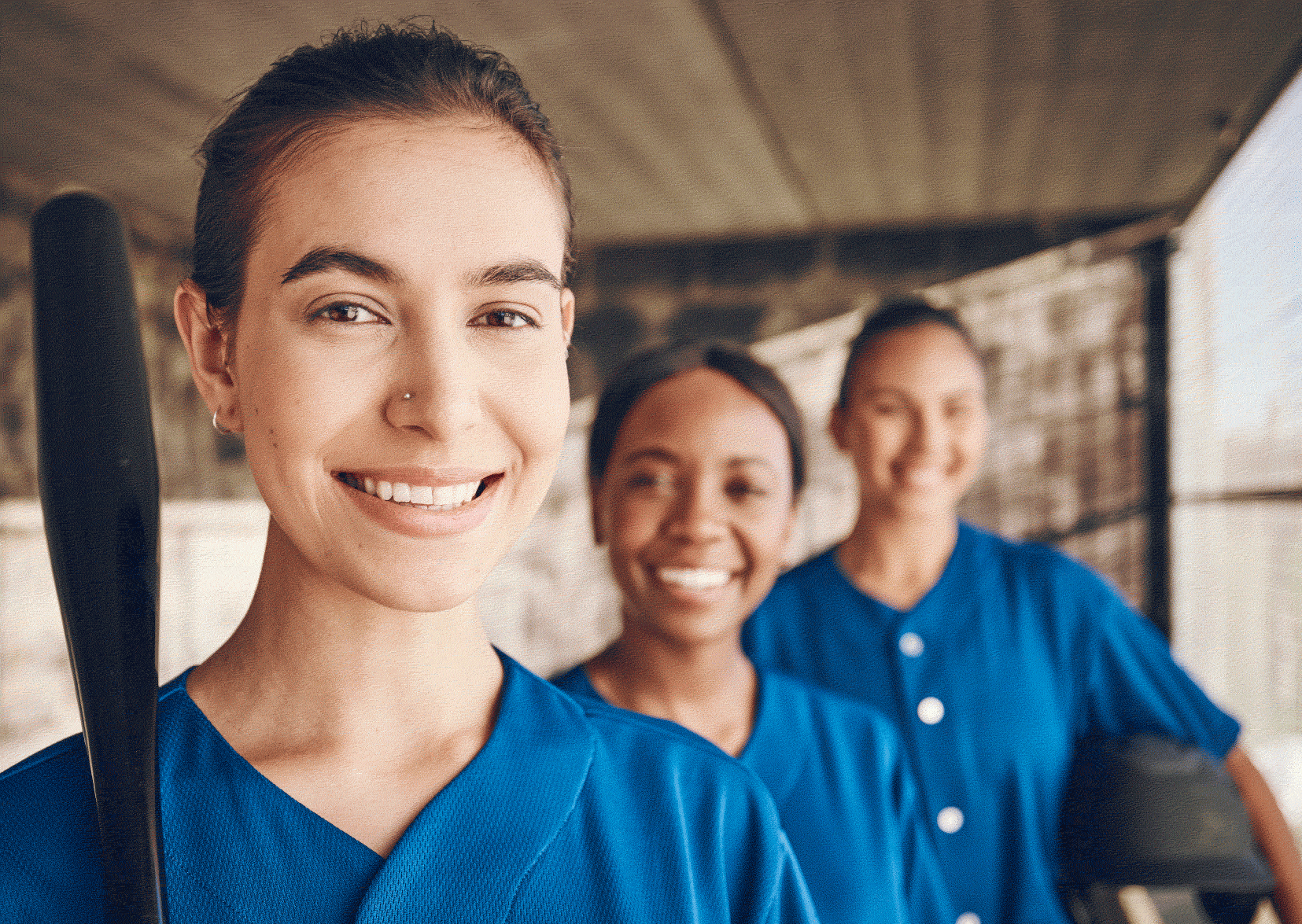 Three woman nurses smiling