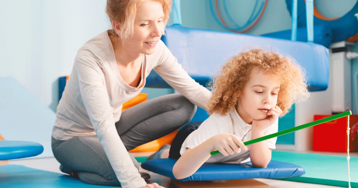 Occupational therapist playing with child