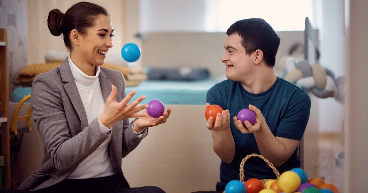 Occupational therapist playing with a child