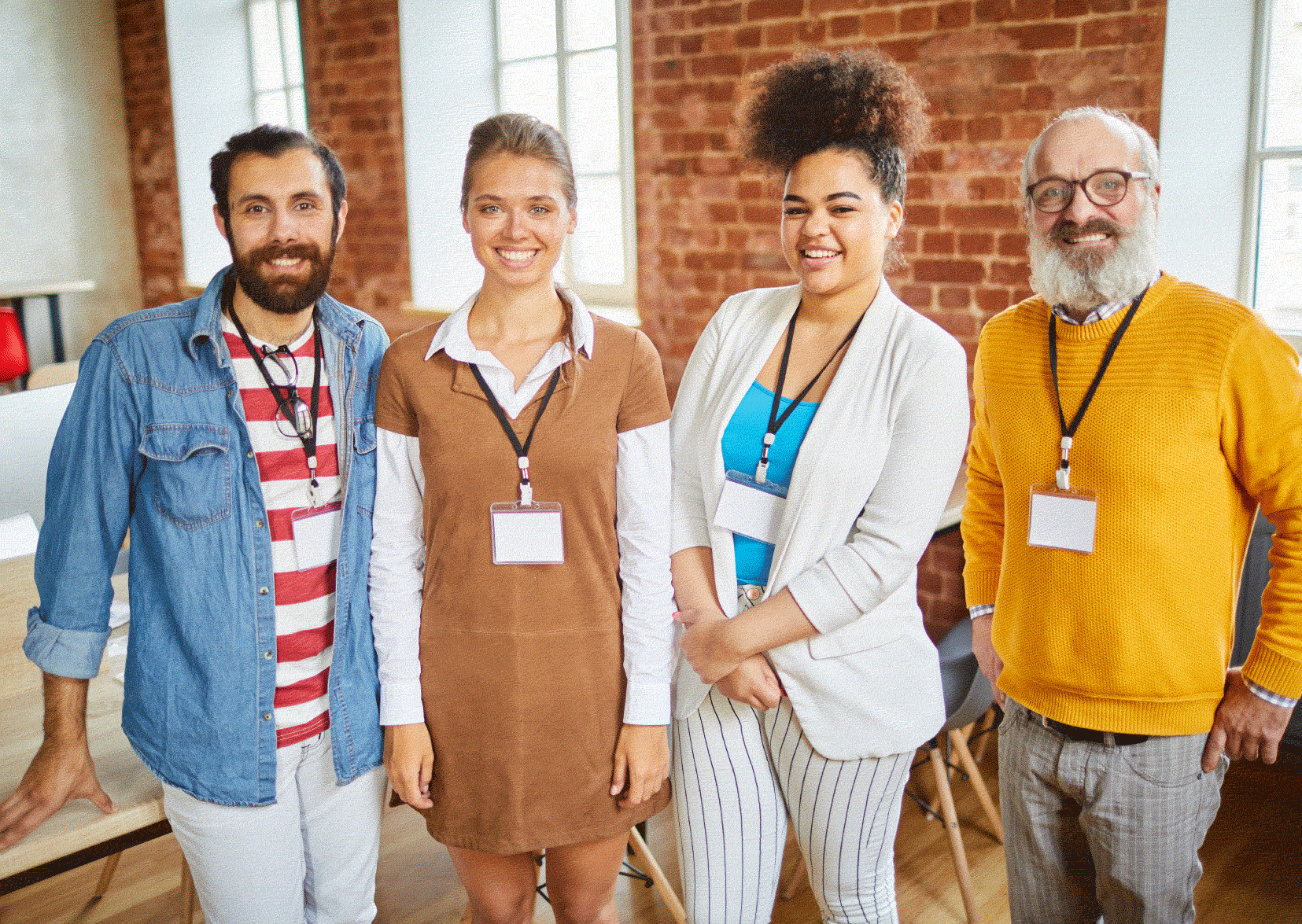 Group of four social workers. Two women, two men